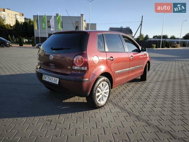 Червоний Фольксваген Поло, об'ємом двигуна 1.39 л та пробігом 339 тис. км за 3850 $, фото 7 на Automoto.ua