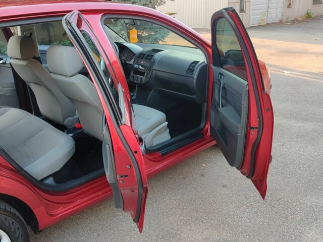 Красный Фольксваген Поло, объемом двигателя 1.4 л и пробегом 240 тыс. км за 4950 $, фото 17 на Automoto.ua