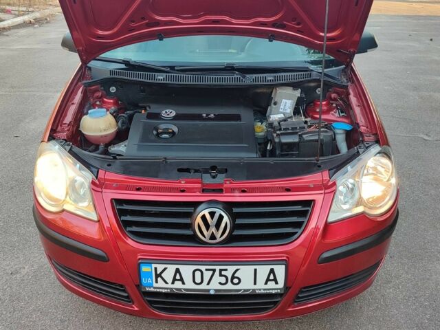 Красный Фольксваген Поло, объемом двигателя 1.4 л и пробегом 240 тыс. км за 4950 $, фото 19 на Automoto.ua