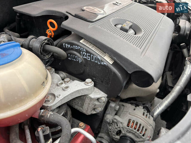 Червоний Фольксваген Поло, об'ємом двигуна 1.4 л та пробігом 180 тис. км за 6000 $, фото 27 на Automoto.ua