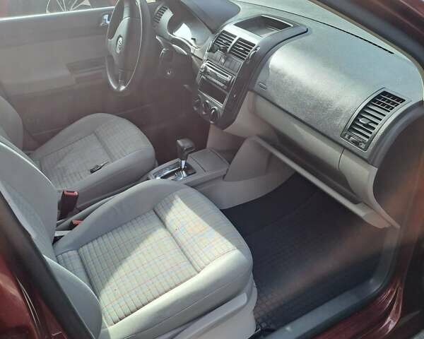 Червоний Фольксваген Поло, об'ємом двигуна 1.39 л та пробігом 189 тис. км за 5500 $, фото 18 на Automoto.ua