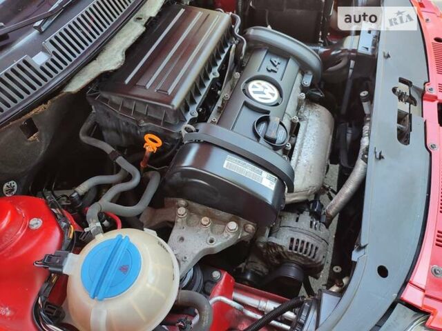 Червоний Фольксваген Поло, об'ємом двигуна 1.4 л та пробігом 198 тис. км за 6650 $, фото 82 на Automoto.ua