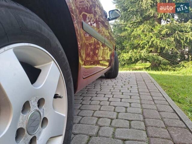 Червоний Фольксваген Поло, об'ємом двигуна 1.39 л та пробігом 189 тис. км за 5500 $, фото 9 на Automoto.ua