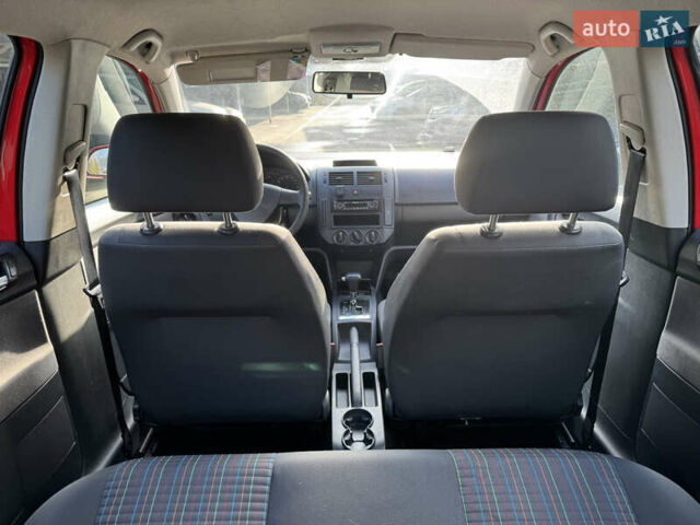 Красный Фольксваген Поло, объемом двигателя 1.4 л и пробегом 105 тыс. км за 6400 $, фото 13 на Automoto.ua