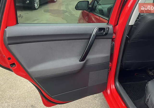 Красный Фольксваген Поло, объемом двигателя 1.4 л и пробегом 200 тыс. км за 4500 $, фото 14 на Automoto.ua