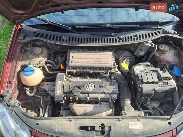 Червоний Фольксваген Поло, об'ємом двигуна 1.39 л та пробігом 189 тис. км за 5500 $, фото 13 на Automoto.ua