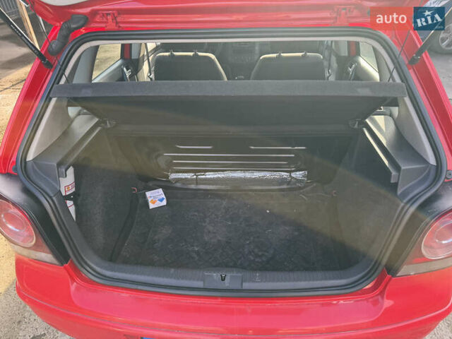 Красный Фольксваген Поло, объемом двигателя 1.4 л и пробегом 105 тыс. км за 6400 $, фото 12 на Automoto.ua