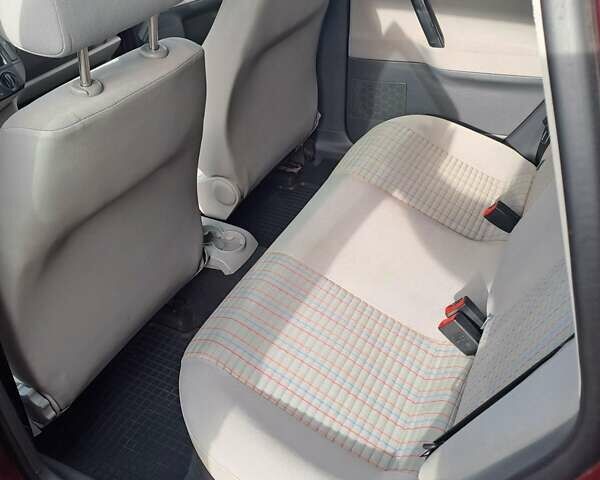 Червоний Фольксваген Поло, об'ємом двигуна 1.39 л та пробігом 189 тис. км за 5500 $, фото 21 на Automoto.ua