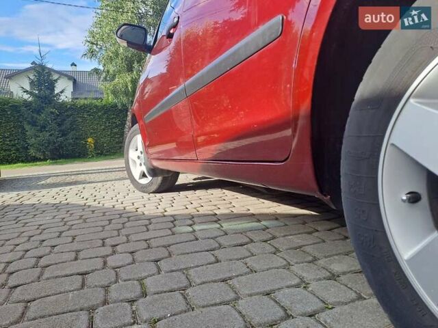 Червоний Фольксваген Поло, об'ємом двигуна 1.39 л та пробігом 189 тис. км за 5500 $, фото 6 на Automoto.ua