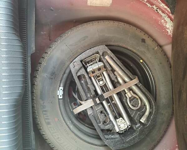 Червоний Фольксваген Поло, об'ємом двигуна 1.39 л та пробігом 189 тис. км за 5500 $, фото 5 на Automoto.ua