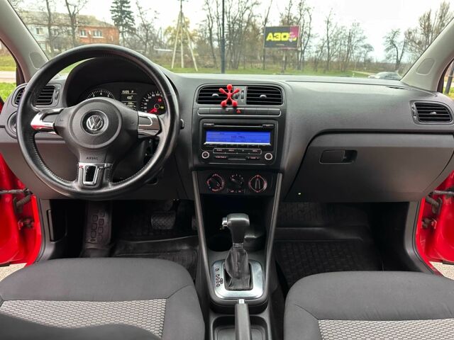 Красный Фольксваген Поло, объемом двигателя 1.4 л и пробегом 158 тыс. км за 6950 $, фото 6 на Automoto.ua