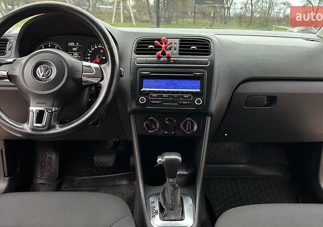 Красный Фольксваген Поло, объемом двигателя 1.39 л и пробегом 158 тыс. км за 6900 $, фото 10 на Automoto.ua