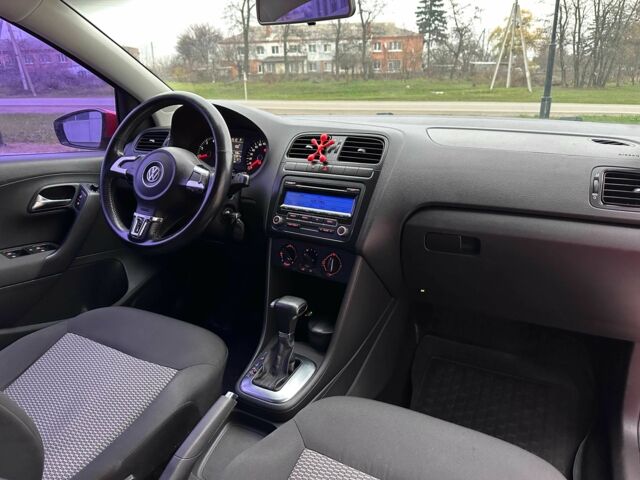 Красный Фольксваген Поло, объемом двигателя 1.4 л и пробегом 158 тыс. км за 6950 $, фото 11 на Automoto.ua