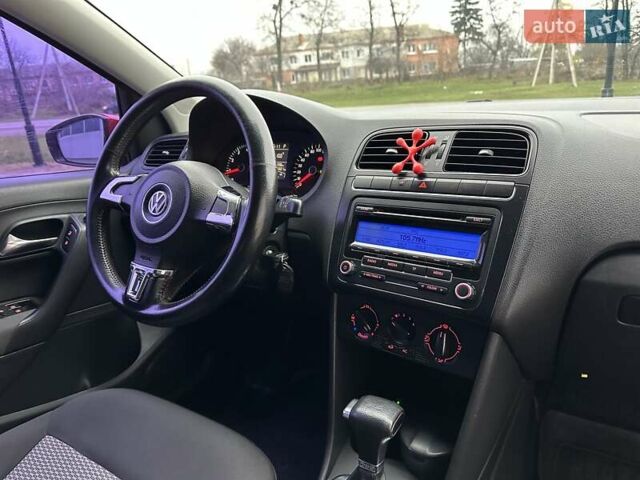Красный Фольксваген Поло, объемом двигателя 1.39 л и пробегом 158 тыс. км за 6900 $, фото 8 на Automoto.ua
