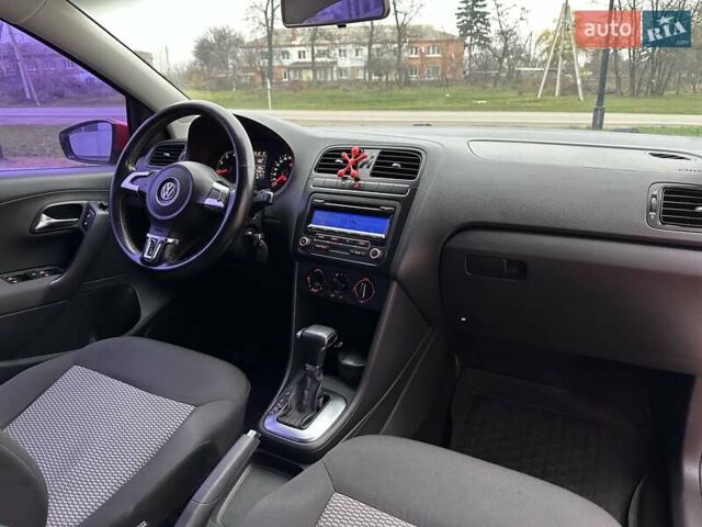 Красный Фольксваген Поло, объемом двигателя 1.39 л и пробегом 158 тыс. км за 6950 $, фото 15 на Automoto.ua