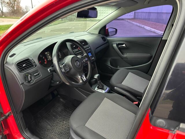 Красный Фольксваген Поло, объемом двигателя 1.4 л и пробегом 158 тыс. км за 6950 $, фото 5 на Automoto.ua