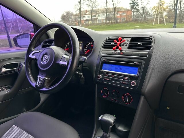 Красный Фольксваген Поло, объемом двигателя 1.4 л и пробегом 158 тыс. км за 6950 $, фото 10 на Automoto.ua