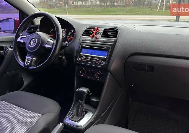 Красный Фольксваген Поло, объемом двигателя 1.39 л и пробегом 158 тыс. км за 6900 $, фото 12 на Automoto.ua