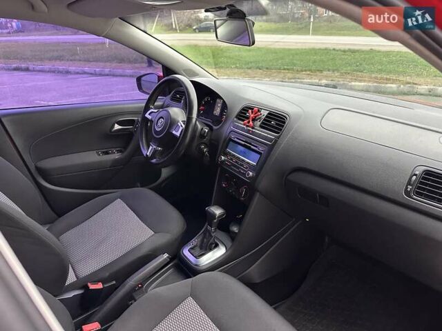 Красный Фольксваген Поло, объемом двигателя 1.39 л и пробегом 158 тыс. км за 6950 $, фото 13 на Automoto.ua