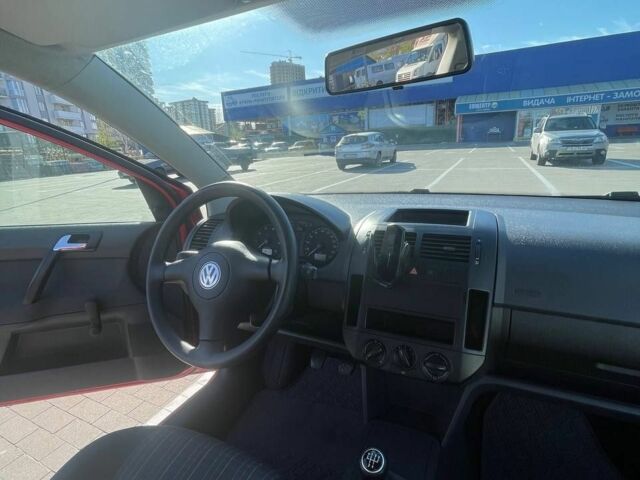 Красный Фольксваген Поло, объемом двигателя 1.2 л и пробегом 168 тыс. км за 4500 $, фото 4 на Automoto.ua