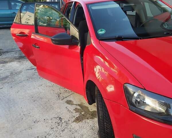 Красный Фольксваген Поло, объемом двигателя 1.2 л и пробегом 150 тыс. км за 6100 $, фото 8 на Automoto.ua