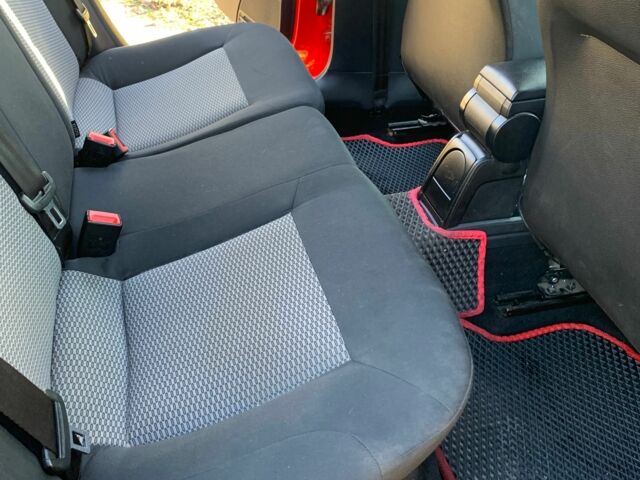 Красный Фольксваген Поло, объемом двигателя 1.4 л и пробегом 167 тыс. км за 6700 $, фото 7 на Automoto.ua