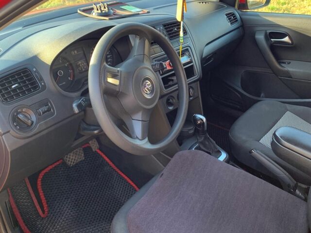 Красный Фольксваген Поло, объемом двигателя 1.4 л и пробегом 167 тыс. км за 6700 $, фото 5 на Automoto.ua