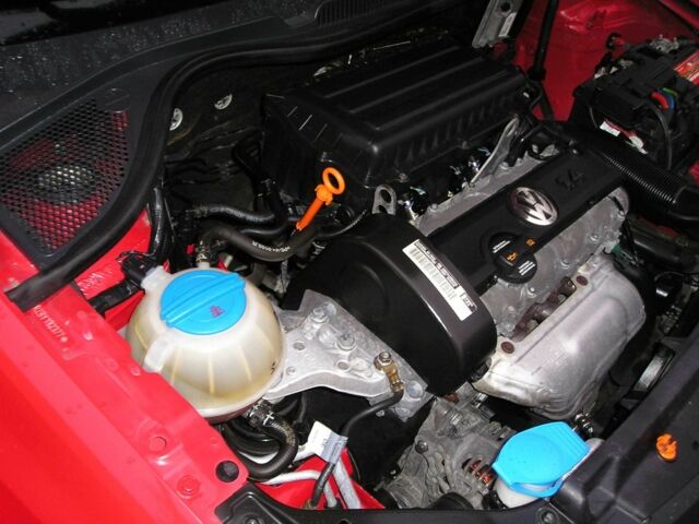 Красный Фольксваген Поло, объемом двигателя 1.4 л и пробегом 85 тыс. км за 8500 $, фото 8 на Automoto.ua