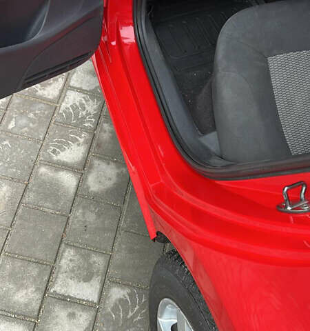 Червоний Фольксваген Поло, об'ємом двигуна 1.39 л та пробігом 180 тис. км за 7850 $, фото 17 на Automoto.ua