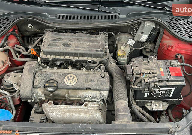 Червоний Фольксваген Поло, об'ємом двигуна 1.39 л та пробігом 180 тис. км за 7850 $, фото 12 на Automoto.ua