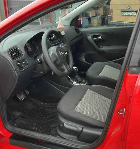 Червоний Фольксваген Поло, об'ємом двигуна 1.39 л та пробігом 180 тис. км за 7850 $, фото 6 на Automoto.ua