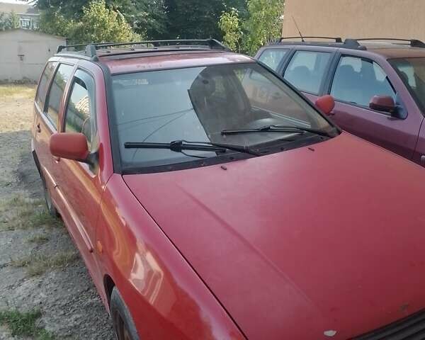 Красный Фольксваген Поло, объемом двигателя 1.39 л и пробегом 185 тыс. км за 2000 $, фото 4 на Automoto.ua