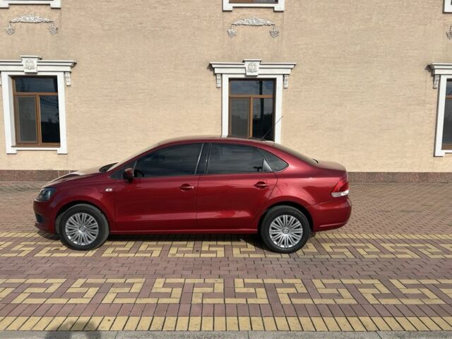 Красный Фольксваген Поло, объемом двигателя 1.6 л и пробегом 210 тыс. км за 7500 $, фото 6 на Automoto.ua