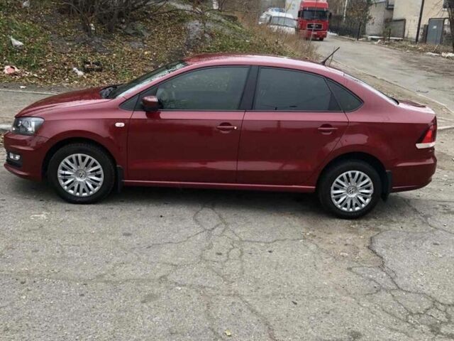 Красный Фольксваген Поло, объемом двигателя 1.4 л и пробегом 111 тыс. км за 9500 $, фото 1 на Automoto.ua