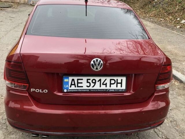 Красный Фольксваген Поло, объемом двигателя 1.4 л и пробегом 111 тыс. км за 9500 $, фото 5 на Automoto.ua