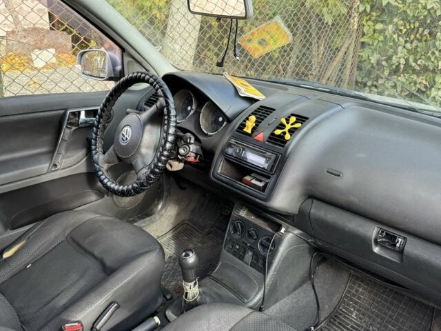 Серый Фольксваген Поло, объемом двигателя 1.4 л и пробегом 380 тыс. км за 1300 $, фото 2 на Automoto.ua