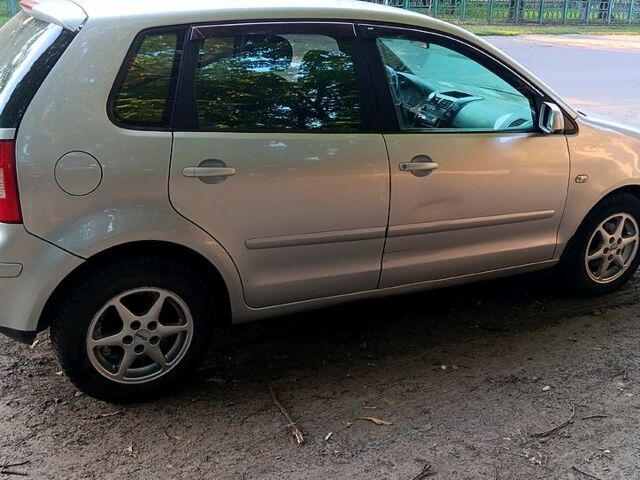 Серый Фольксваген Поло, объемом двигателя 1.4 л и пробегом 200 тыс. км за 3150 $, фото 5 на Automoto.ua