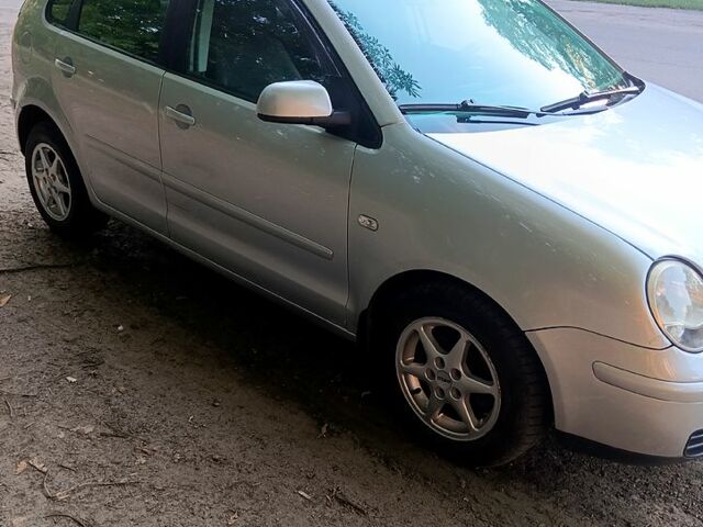 Серый Фольксваген Поло, объемом двигателя 1.4 л и пробегом 200 тыс. км за 3150 $, фото 4 на Automoto.ua