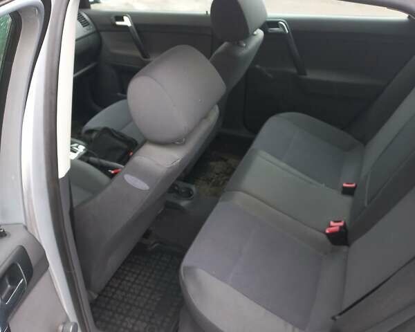 Сірий Фольксваген Поло, об'ємом двигуна 1.39 л та пробігом 206 тис. км за 4800 $, фото 1 на Automoto.ua