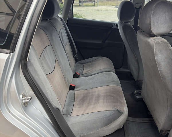 Серый Фольксваген Поло, объемом двигателя 1.39 л и пробегом 205 тыс. км за 3300 $, фото 10 на Automoto.ua