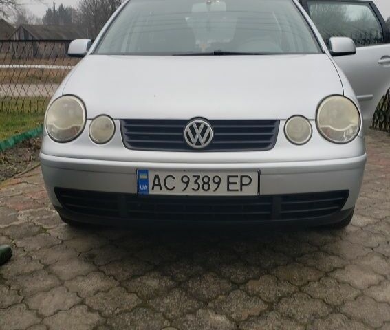 Серый Фольксваген Поло, объемом двигателя 1.2 л и пробегом 250 тыс. км за 4500 $, фото 1 на Automoto.ua