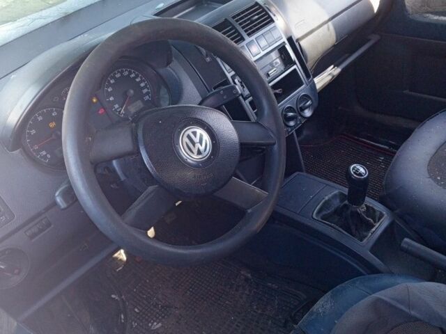 Серый Фольксваген Поло, объемом двигателя 1.4 л и пробегом 200 тыс. км за 1550 $, фото 4 на Automoto.ua