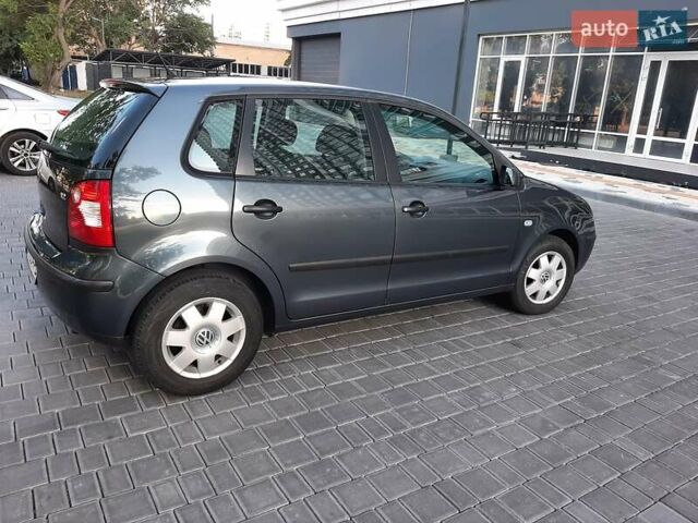 Серый Фольксваген Поло, объемом двигателя 1.2 л и пробегом 205 тыс. км за 4700 $, фото 2 на Automoto.ua