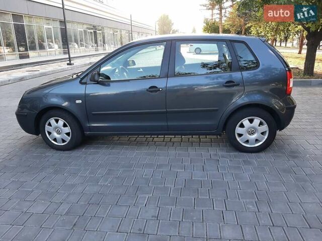 Серый Фольксваген Поло, объемом двигателя 1.2 л и пробегом 205 тыс. км за 4700 $, фото 3 на Automoto.ua
