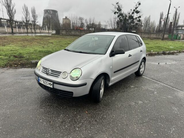 Серый Фольксваген Поло, объемом двигателя 1.4 л и пробегом 301 тыс. км за 3950 $, фото 1 на Automoto.ua