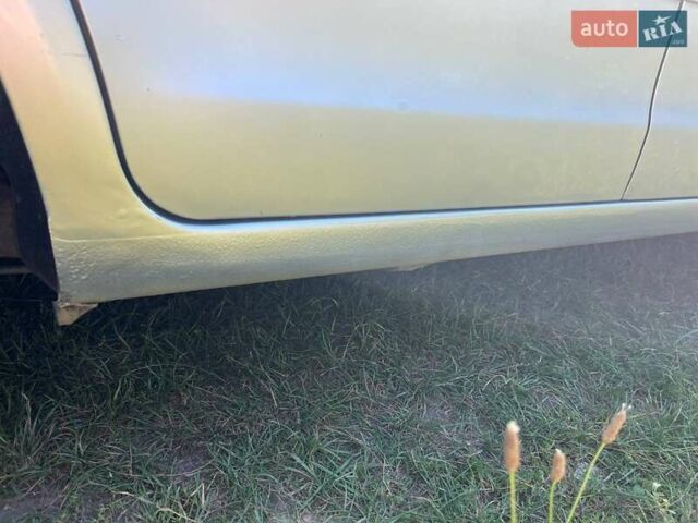 Серый Фольксваген Поло, объемом двигателя 1.4 л и пробегом 207 тыс. км за 4400 $, фото 9 на Automoto.ua