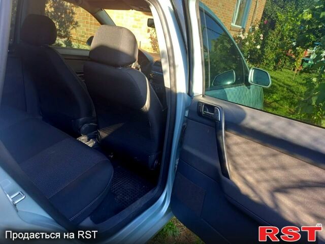 Серый Фольксваген Поло, объемом двигателя 1.4 л и пробегом 328 тыс. км за 4350 $, фото 4 на Automoto.ua