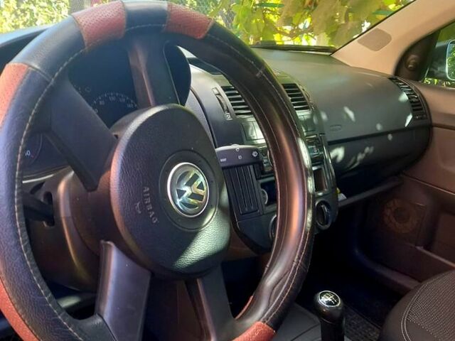 Серый Фольксваген Поло, объемом двигателя 1.4 л и пробегом 328 тыс. км за 4350 $, фото 2 на Automoto.ua