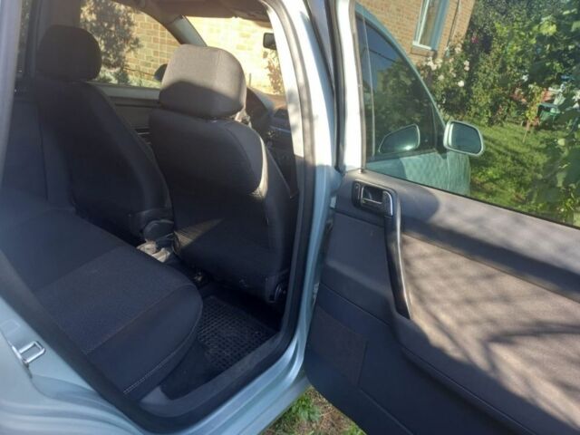 Серый Фольксваген Поло, объемом двигателя 1.4 л и пробегом 328 тыс. км за 4350 $, фото 5 на Automoto.ua