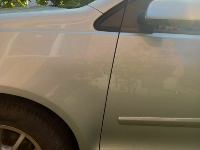 Серый Фольксваген Поло, объемом двигателя 1.4 л и пробегом 328 тыс. км за 4350 $, фото 2 на Automoto.ua